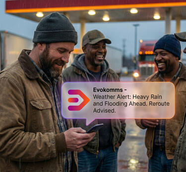 Illustration of an EvoKomms notification alerting a truck driver about heavy rain, flooding and a new route update | EvoKomms